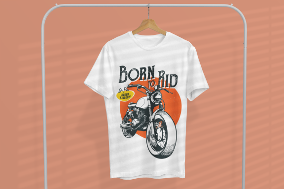 White t-shirt featuring a motorcycle graphic and "Born to Ride" text on an orange background.